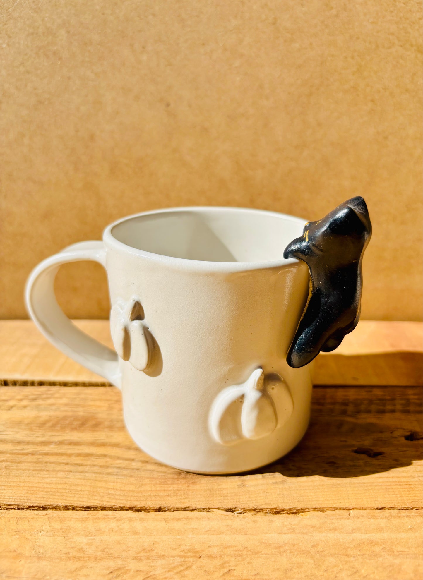 Mug with small white pumpkins