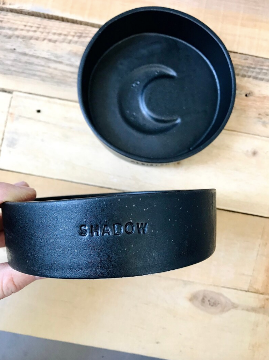 Pet bowl with black moon pattern