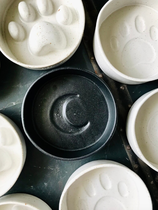 Pet bowl with black moon pattern