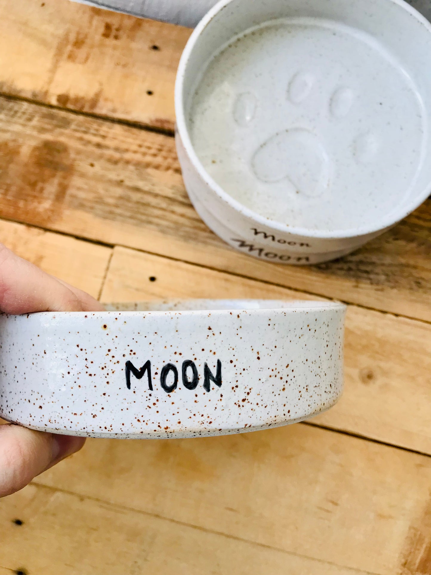 Pet bowl with white moon pattern